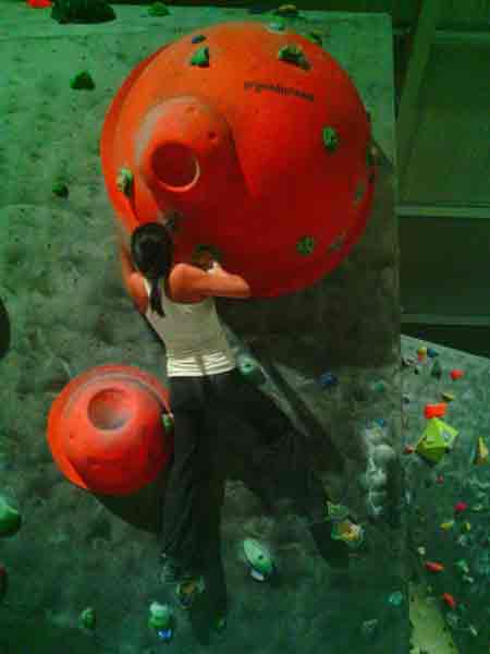 Yamila rock climbing